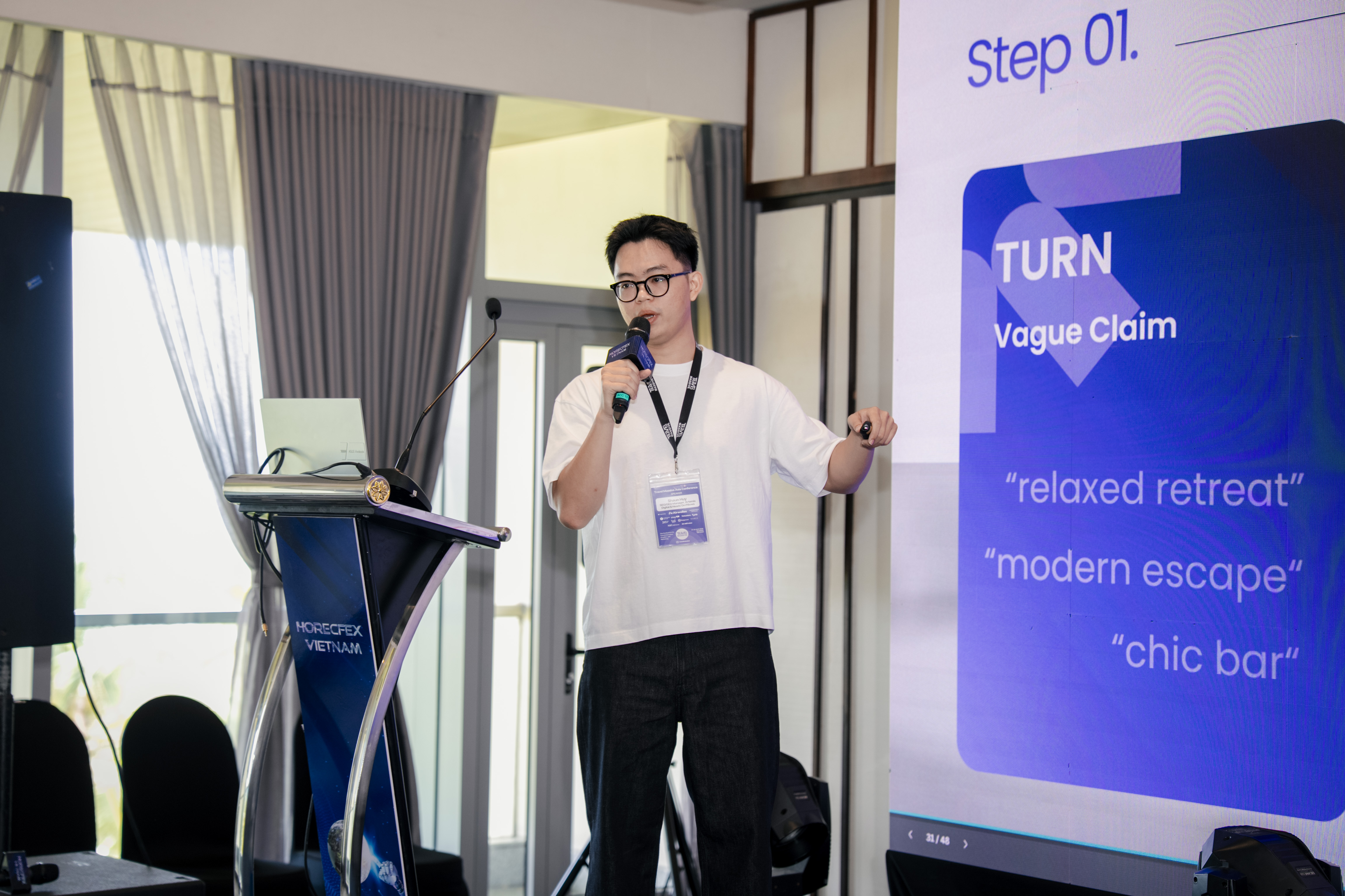 Shaun Huy presenting practical AI search concepts at a hospitality event